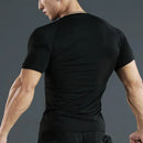 Camiseta masculina de compressão para corrida, fitness e treino. Manga curta, ajuste justo, secagem rápida, ideal para academia e jogging.