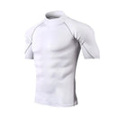 Camiseta de compressão masculina, esportiva, com secagem rápida e mangas curtas.