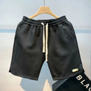 Shorts de corrida masculinos, leves, com estampa de ondas e secagem rápida.