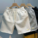 Shorts de corrida masculinos, leves, com estampa de ondas e secagem rápida.