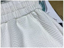 Shorts de corrida masculinos, leves, com estampa de ondas e secagem rápida.