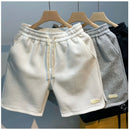 Shorts de corrida masculinos, leves, com estampa de ondas e secagem rápida.