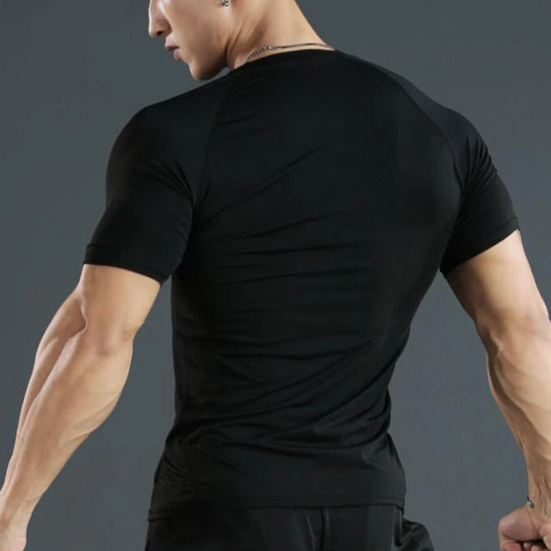 Camiseta masculina de compressão para corrida, fitness e treino. Manga curta, ajuste justo, secagem rápida, ideal para academia e jogging.