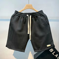 Shorts de corrida masculinos, leves, com estampa de ondas e secagem rápida.