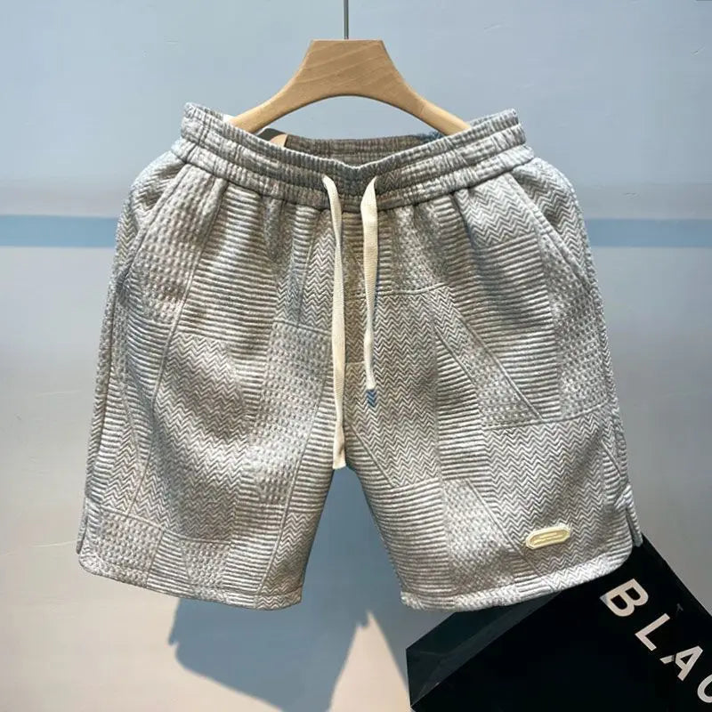 Shorts de corrida masculinos, leves, com estampa de ondas e secagem rápida.