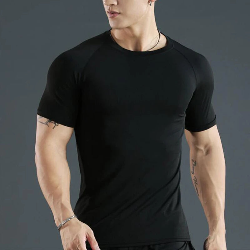 Camiseta masculina de compressão para corrida, fitness e treino. Manga curta, ajuste justo, secagem rápida, ideal para academia e jogging.